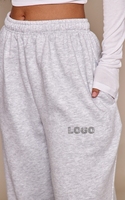 Fabricants OEM sur mesure de pantalons de survêtement à taille élastique 100% coton, pantalons de survêtement larges et droits pour femmes