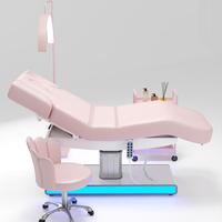 Cama de belleza eléctrica de lujo para salón de Spa, cama Robot de masaje para salón, mesa de masaje portátil moderna, cabezal Facial de madera, cama de masaje