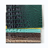 Cuir d'imitation crocodile vert avec une sensation de cuir véritable