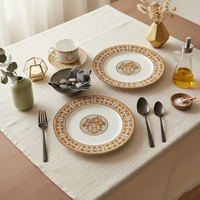 Service de table de luxe en porcelaine fine H Bone China avec assiettes de présentation en céramique orange, tasses à café et bols pour événements de mariage