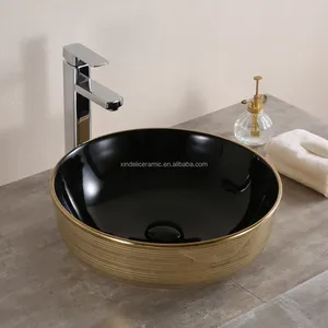 Lavandino da bagno in ceramica con lavabo in oro dorato elegante nuovo modello placcato nero di moda