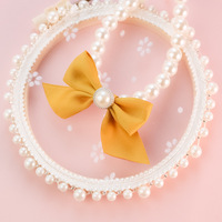 2023 vente en gros nouveau haute qualité classique perle mignon collier pour animaux de compagnie chien bijoux luxe chat collier GPS Tracker avec cloche arc