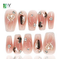 Uñas postizas de gel metálicas con corazón, estilo gótico romántico, al por mayor, color nude, hechas a mano, con diamantes de lujo y diseño, para pegar.