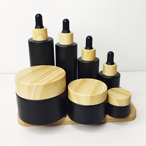 ขวดแก้วใส่เครื่องสำอางสีดำขนาด 30 กรัม แบบกำหนดเองจากโรงงาน สำหรับบรรจุเซรั่มน้ำมันบำรุงเส้นผม ขวดแก้วแบบไหล่เรียบสีด้านพร้อมหัวหยด - Product Image 4
