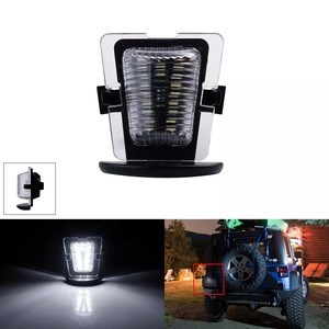 Luz LED para Matrícula de Jeep Wrangler 68064721AA, Tipo de Abrazadera, Luz Blanca, Carcasa Transparente, Distancia entre Orificios de 175 mm - Product Image 1