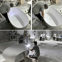 Baignoire autoportante moderne en pierre artificielle à surface solide avec fonction de trempage, disponible en plusieurs couleurs pour salle de bain d'appartement