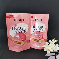 Sac de détergent à lessive autoportant rose portable de 500ml trois couches pour un grand inventaire de vêtements