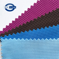 T-shirt de sport tricoté à la machine circulaire demi-brillant 100% polyester mini tissu gaufré
