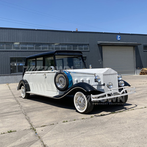 Coche de Lujo Bicolor Blanco y Negro, Estilo Vintage, Eléctrico, con Llanta de Repuesto, para Bodas y Eventos - Product Image 1