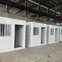 Garage de conteneurs en acier préfabriqué à faible coût-Entrepôt de stockage modulaire portable avec porte à volet roulant