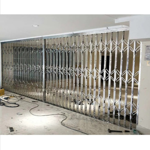 Puerta Enrollable de Acero Inoxidable 304, Retráctil, Control Manual, Industrial, Duradera, Fácil Instalación - Product Image 1