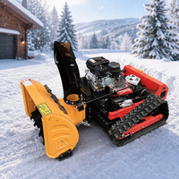 Tondeuse à gazon tout-terrain télécommandée sur chenilles en caoutchouc avec accessoire souffleur à neige