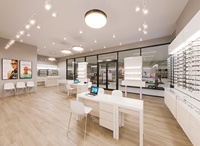 Vitrines optiques d'étagères à lunettes personnalisées pour la décoration intérieure de magasin d'optique