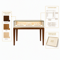 Vitrine de présentation de bijoux haut de gamme, armoire en verre avec pieds en bois et bande LED intégrée pour boutique et magasin de vente de bijoux