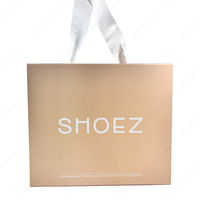Caja de regalo de papel de ropa con imán plegable, caja de regalo magnética de embalaje de barco plano, caja plegable con cinta de transporte