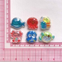 Breloques en résine à paillettes représentant des créatures marines (poulpe, poisson, dauphin) pour la création de pendentifs, colliers et coques de téléphone faits main
