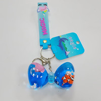 Porte-clés liquide en forme d'arc en acrylique avec figurines de poisson-clown et dauphin, paillettes flottantes, pendentif de sac, logo personnalisé, souvenir