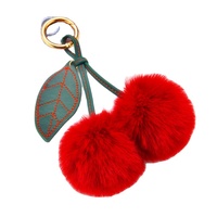 Vente en gros de boule bouffante colorée en peluche d'affaires de créateur Porte-clés à pompon en peluche en fausse fourrure rose pour femmes et filles
