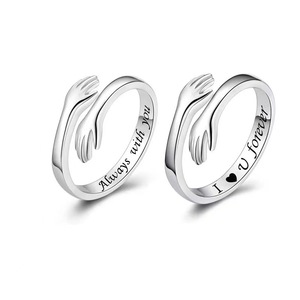 Venta al por mayor Hot Hug Me Rings <span class=keywords><strong>para</strong></span> pareja Hugging Hand Rings I Love You Forever Hug Ring banda ajustable joyería regalo <span class=keywords><strong>para</strong></span> chicas adolescentes - Product Image 1