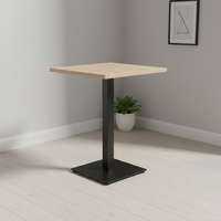 Table de salle à manger intérieure moderne de style commercial avec plateau et base en acier