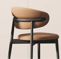 Chaise de salle à manger moderne à dossier incurvé et rembourrée avec pieds en métal noir, chaise de loisirs nordique pour la maison, restaurant, mobilier OEM ODM