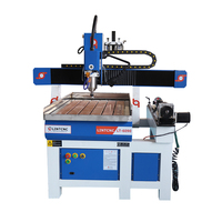 Grabado en madera de alta precisión CNC 6090 enrutador CNC de madera máquina de corte de aluminio con husillo de refrigeración por agua de 1.5kw/2.2kw/3.0kw