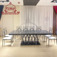 Table de salle à manger moderne en acier inoxydable et verre avec plateau en MDF pour événements hôteliers et utilisation en extérieur, couleur noire