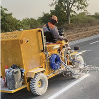 Machine de marquage routier à pulvérisation à froid de petite taille, type autoporté