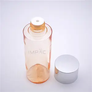 Frasco de óleo de soro capilar personalizado laranja transparente de plástico rígido 150ml com tampa prateada luxuosa