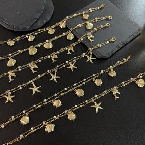 नई डिजाइन 2 परतों समुद्री जीवन मोती श्रृंखला समुद्र तट मछली शेल मछली स्टार डॉल्फिन चार्म्स स्टेनलेस स्टील महिला - Product Image 1