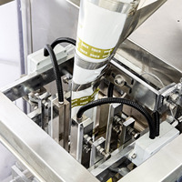 Machine d'emballage verticale de haute précision contrôlée par PLC en acier inoxydable 304 JOIE CHINA JEV-300 pour liquides, granulés, miel, bonbons, chili