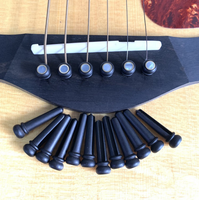 Chevilles de pont de guitare en ébène avec incrustation de nacre blanche et anneau en laiton