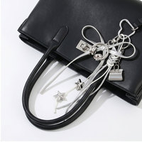 Breloque de sac en cuir PU avec nœud papillon argenté et étoile, porte-clés tendance, pendentif pour sac à main, accessoires pour femmes