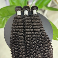 Venta al por mayor 100% cabello humano real rizado trama de extensiones de cabello de alta calidad Color Natural vietnamita pelo crudo Paquete de Color negro