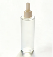 Flacon en verre ambré rond de 50 ml/100 ml avec pipette, opaque, givré, imprimé avec le logo YOGO, pour les gouttes pour les yeux