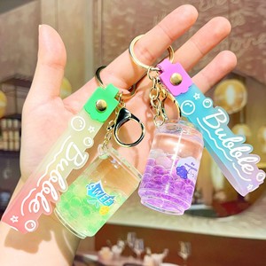 Porte-clés en acrylique en forme de <span class=keywords><strong>bouteille</strong></span> de boisson, avec perles liquides à bulles, design Cola/Soda, grand pendentif en forme de canette, style mignon, pour entreprise - Product Image 2
