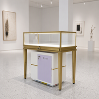 Elegante Gold-Weiße LED-beleuchtete Langlebige Gehärtete Glas-Verkaufstheke Vitrine mit Unterschubladen für Einkaufszentren