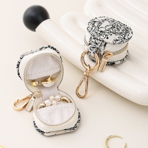 Portable Mini Travel Jewelry Box Simple New Round PU Leather <b>Case</b> for Pendant <b>Earrings</b> and Rings Keychain Included - Product Image 4