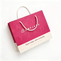 Sac de shopping de luxe en papier rose avec logo personnalisé, poignée en corde de coton, sac à boucle pour chaussures, pour les marques de beauté et de mode