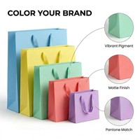 Eco Recycled Kraft Paperboard Packaging Bag UV Coating Cotton Rope Handles Custom Size Color for Boutique Hand Gifts Holiday