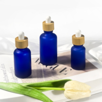 Bouteilles d'huile essentielle cylindriques rondes personnalisées avec compte-gouttes en verre 5ml 10ml 15ml 20ml 30ml 50ml 100ml Emballage de bouteilles d'huile d'olive
