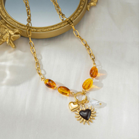 Collier en acier inoxydable avec perles de résine ambrée, breloque cœur noir soleil, fausse perle, fermoir OT plaqué or 18 carats, bijoux inaltérables