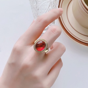 เครื่องประดับแฟชั่น แหวนทองแดงรูปไข่ขนาด 10*12 มม. ประดับเพทายสีแดง ป้องกันการหมองคล้ำ ชุบทอง 18K สำหรับสวมใส่ในชีวิตประจำวันอย่างมีระดับ - Product Image 6