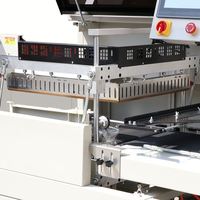 Machine d'emballage rétractable pour boîte-cadeau de thé Machine d'emballage thermorétractable entièrement automatique