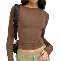 Nouveau T-shirt tendance automne 2024 pour femmes, style européen et américain, haut uni à col rond et manches longues