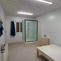 Conteneur habitable pliable et respirant de 20 pieds, facile à déplacer et à installer, avec design moderne, solution complète pour projet, salle de bain incluse