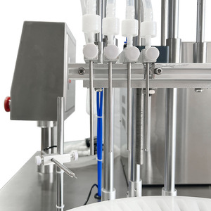 Machine de remplissage et de bouchage de liquides multifonctionnelle à haute productivité pour bouteilles, semi-automatique, pneumatique, contrôle PLC, facile à utiliser - Product Image 2