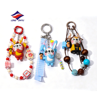 Longzhiyu, fabricant de figurines 3D en PVC, de porte-clés mousquetons, de figurines en caoutchouc et de pendentifs pour clés de voiture et sacs, avec logo personnalisé, durables, sur le thème de l'anime, 20 ans d'expérience