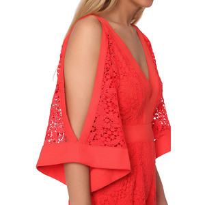 Tutina in pizzo arancione con dettagli a spalle scoperte - Product Image 1