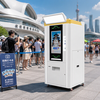 Borne photo libre-service Skineat avec impression de photos et distributeur d'autocollants pour événements en centre commercial